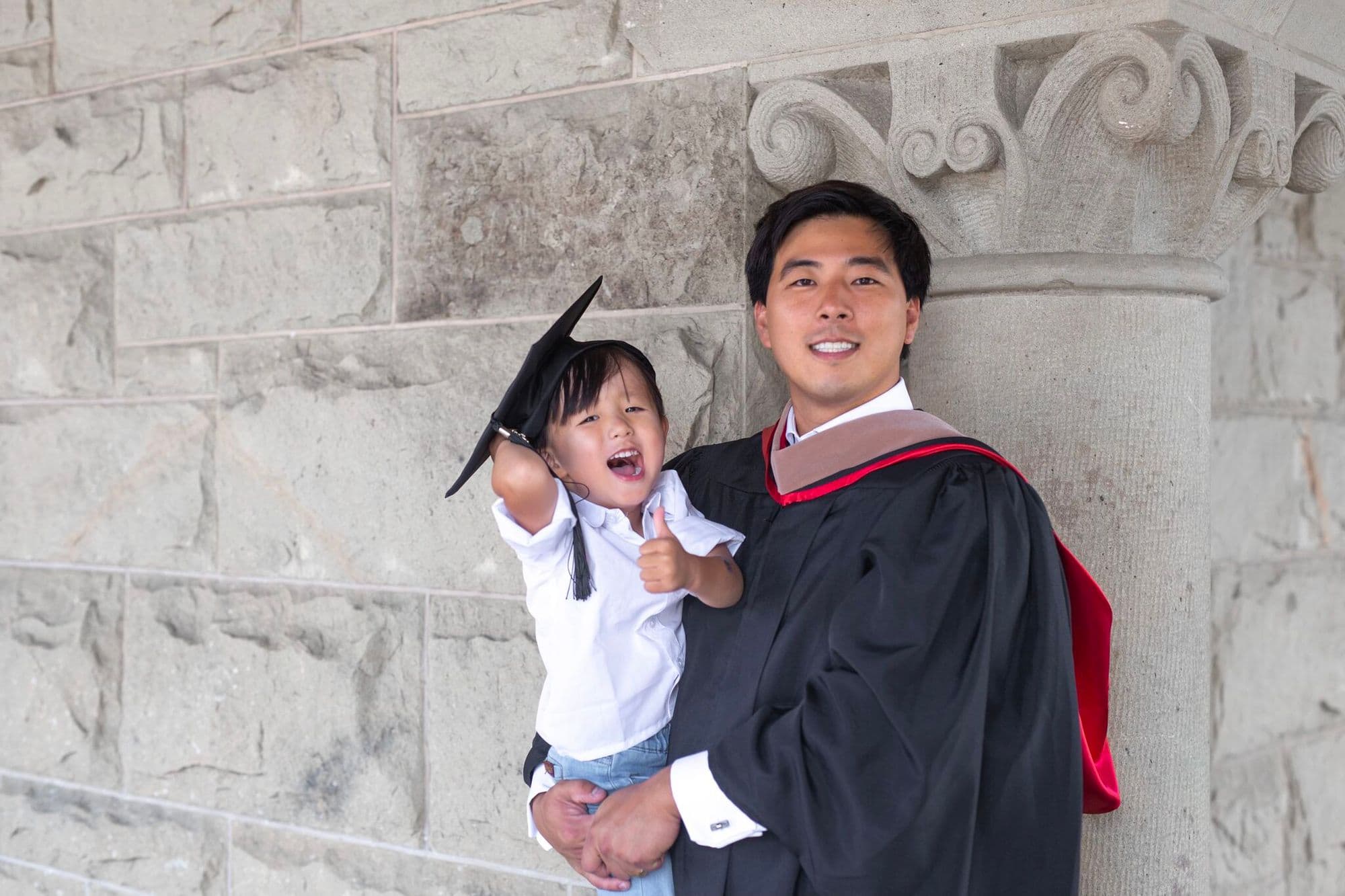 Bennett Lee with his son Emerson celebrating Stanford graduation